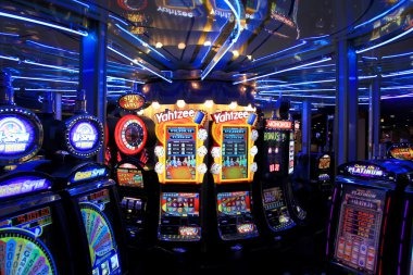 Betting chips and roulette wheel closeup